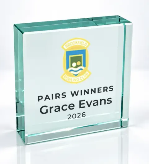 Small square glass award printed with a club crest and the wording Pairs Winners, Grace Evans, 2026