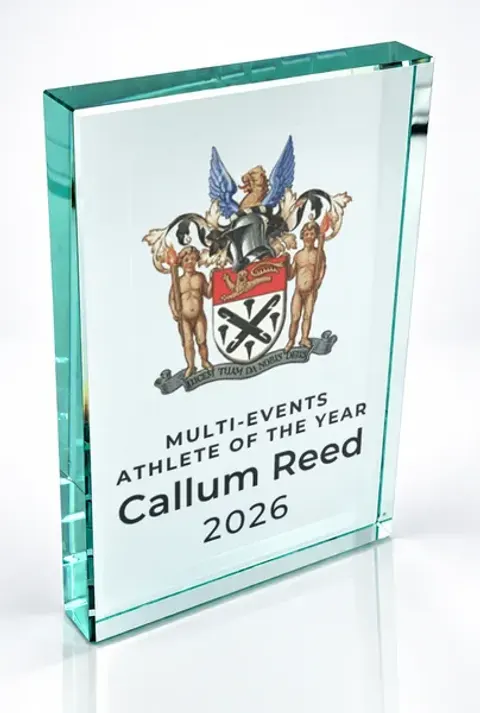 Large portrait glass award printed with a club crest and the wording Multi-Events Athlete Of The Year, Callum Reed, 2026