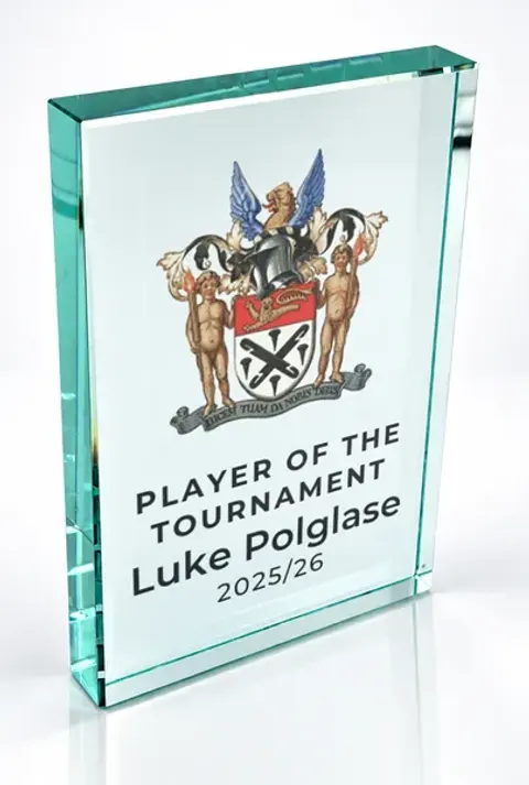 Large portrait glass award printed with a club crest and the wording Player Of The Tournament, Luke Polglase, 2025/26