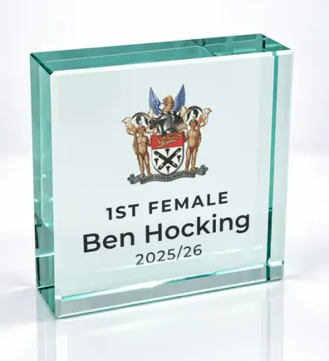 Small square glass award printed with a club crest and the wording 1St Female, Ben Hocking, 2025/26