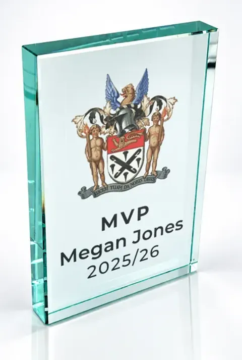 Large portrait glass award printed with a club crest and the wording Mvp, Megan Jones, 2025/26