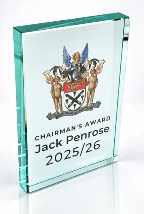 Large portrait glass award printed with a club crest and the wording Chairman'S Award, Jack Penrose, 2025/26