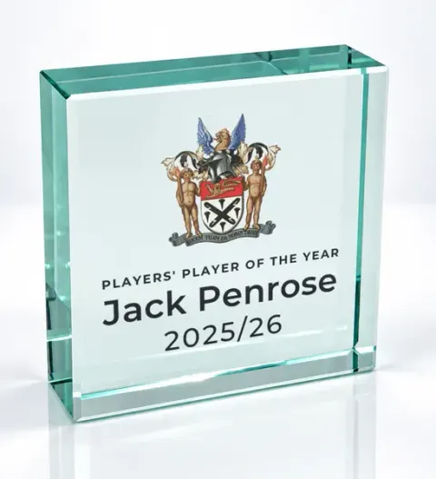 Small square glass award printed with a club crest and the wording Players' Player Of The Year, Jack Penrose, 2025/26