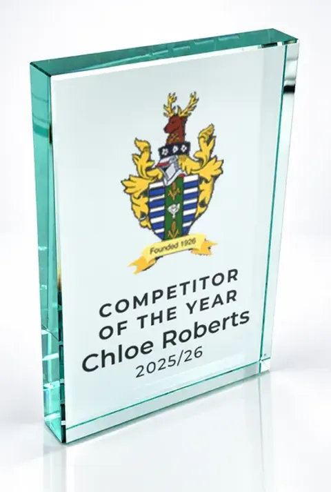 Large portrait glass award printed with a club crest and the wording Competitor Of The Year, Chloe Roberts, 2025/26