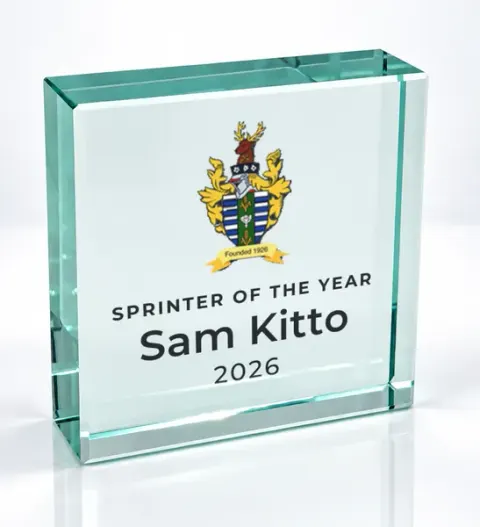 Small square glass award printed with a club crest and the wording Sprinter Of The Year, Sam Kitto, 2026