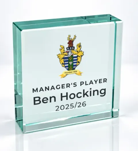 Small square glass award printed with a club crest and the wording Manager'S Player, Ben Hocking, 2025/26