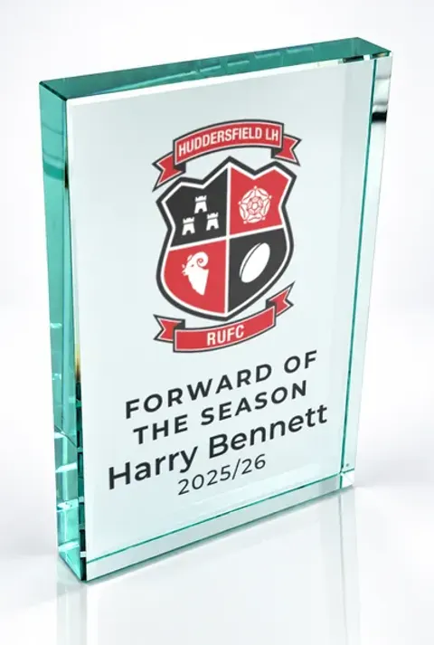 Large portrait glass award printed with a club crest and the wording Forward Of The Season, Harry Bennett, 2025/26