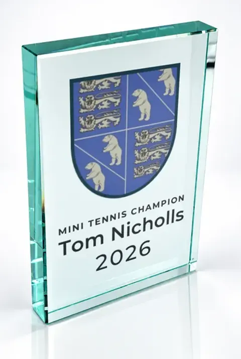 Large portrait glass award printed with a club crest and the wording Mini Tennis Champion, Tom Nicholls, 2026