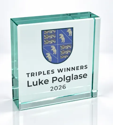 Small square glass award printed with a club crest and the wording Triples Winners, Luke Polglase, 2026