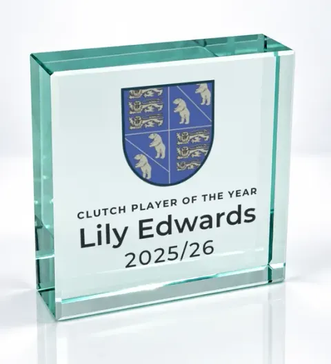Small square glass award printed with a club crest and the wording Clutch Player Of The Year, Lily Edwards, 2025/26