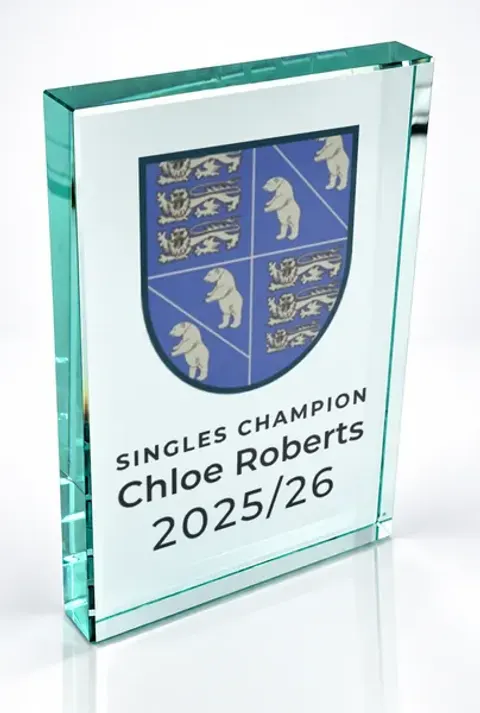 Large portrait glass award printed with a club crest and the wording Singles Champion, Chloe Roberts, 2025/26
