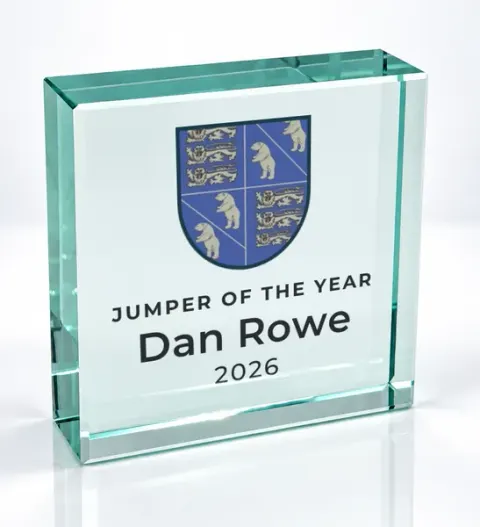 Small square glass award printed with a club crest and the wording Jumper Of The Year, Dan Rowe, 2026