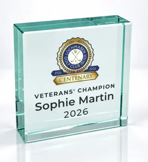 Small square glass award printed with a club crest and the wording Veterans' Champion, Sophie Martin, 2026
