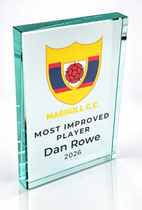Large portrait glass award printed with a club crest and the wording Most Improved Player, Dan Rowe, 2026