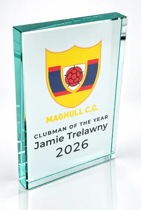 Large portrait glass award printed with a club crest and the wording Clubman Of The Year, Jamie Trelawny, 2026