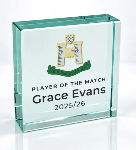 Small square glass award printed with a club crest and the wording Player Of The Match, Grace Evans, 2025/26