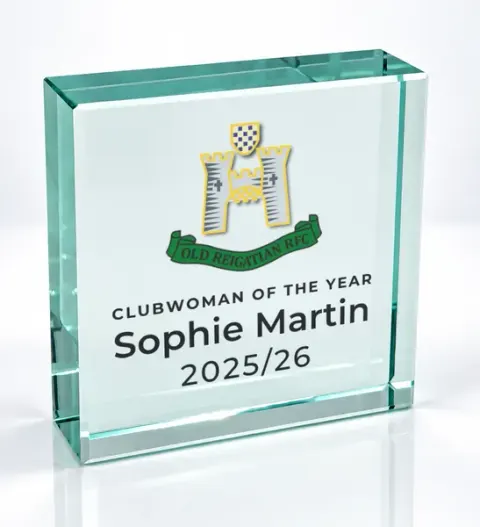 Small square glass award printed with a club crest and the wording Clubwoman Of The Year, Sophie Martin, 2025/26