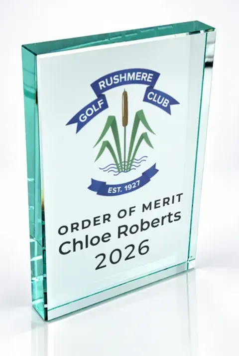 Large portrait glass award printed with a club crest and the wording Order Of Merit, Chloe Roberts, 2026