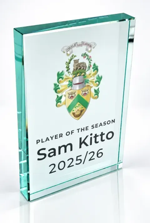 Large portrait glass award printed with a club crest and the wording Player Of The Season, Sam Kitto, 2025/26