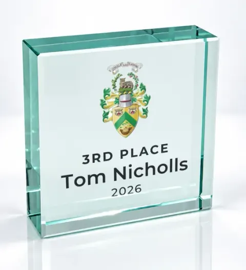 Small square glass award printed with a club crest and the wording 3Rd Place, Tom Nicholls, 2026