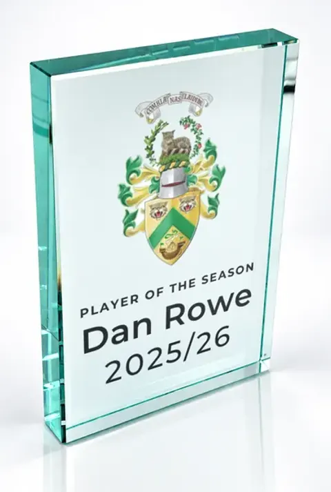 Large portrait glass award printed with a club crest and the wording Player Of The Season, Dan Rowe, 2025/26