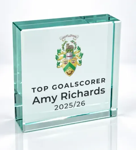 Small square glass award printed with a club crest and the wording Top Goalscorer, Amy Richards, 2025/26