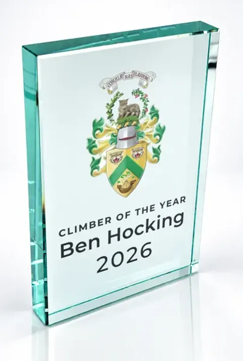 Large portrait glass award printed with a club crest and the wording Climber Of The Year, Ben Hocking, 2026