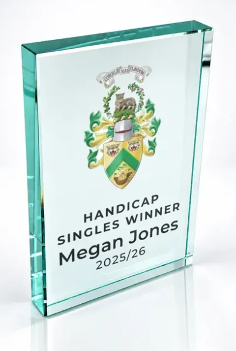Large portrait glass award printed with a club crest and the wording Handicap Singles Winner, Megan Jones, 2025/26