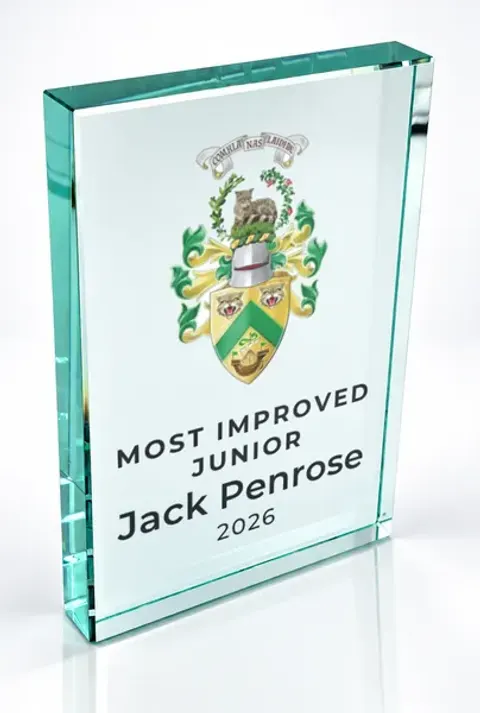 Large portrait glass award printed with a club crest and the wording Most Improved Junior, Jack Penrose, 2026