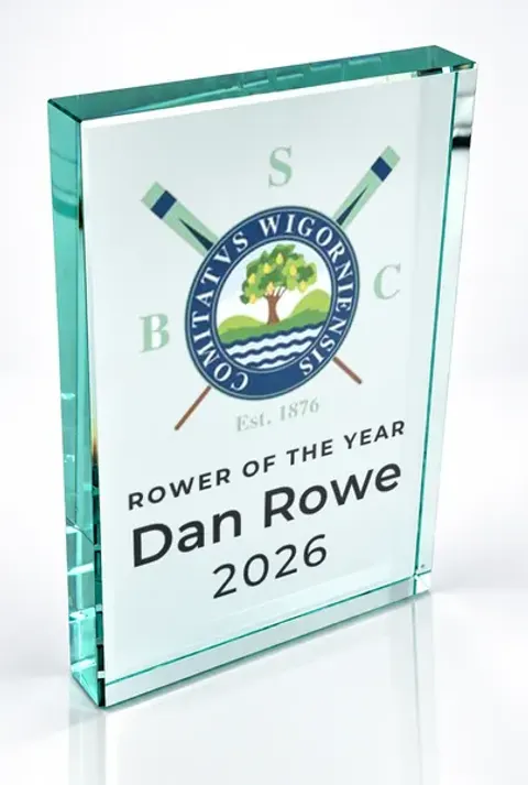 Large portrait glass award printed with a club crest and the wording Rower Of The Year, Dan Rowe, 2026